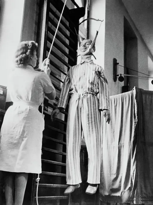Framed Print : Man With Paralysis Hanging For Treatment