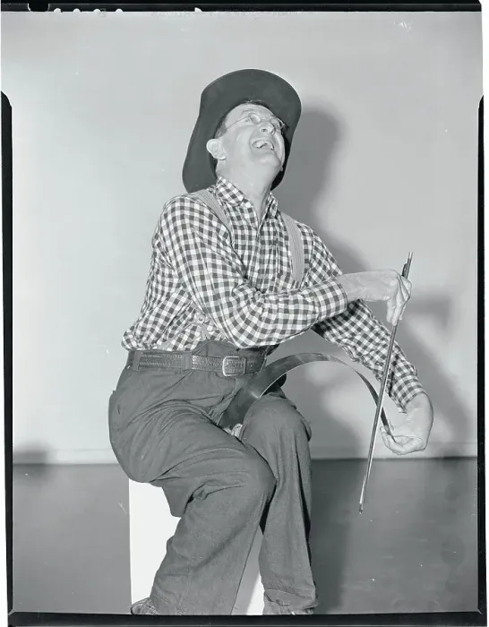 Framed Print : Man Performing with a Saw Framed Print : Man Performing with a Saw
