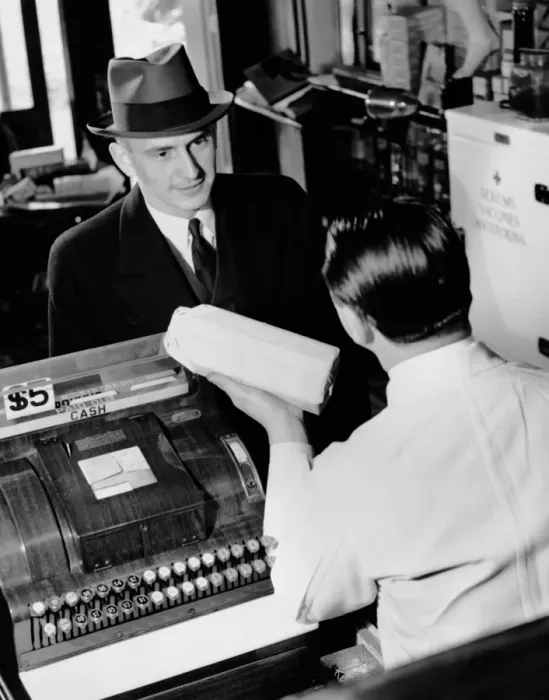 Framed Print : Man picking up prescription in pharmacy Framed Print : Man picking up prescription in pharmacy