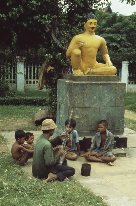 Framed Print : Man Playing Instrument In Phnom Penh Framed Print : Man Playing Instrument In Phnom Penh
