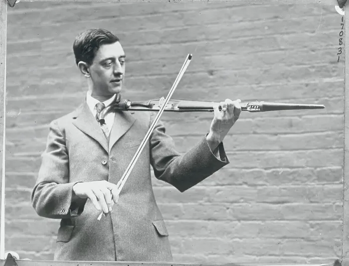 Framed Print : Man Playing Unique Instrument Framed Print : Man Playing Unique Instrument