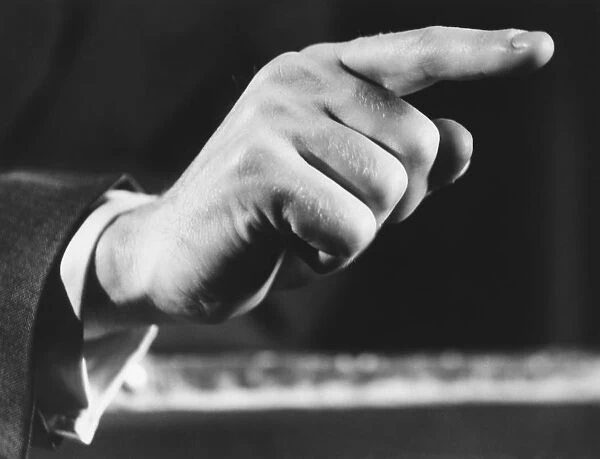 Man pointing, close-up of hand, (B&W)
