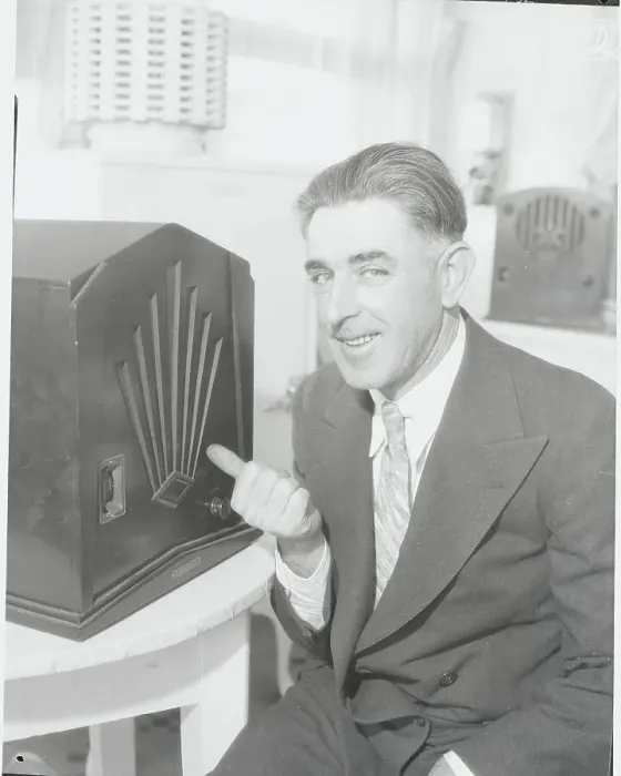 Framed Print : Man Pointing to Radio Framed Print : Man Pointing to Radio