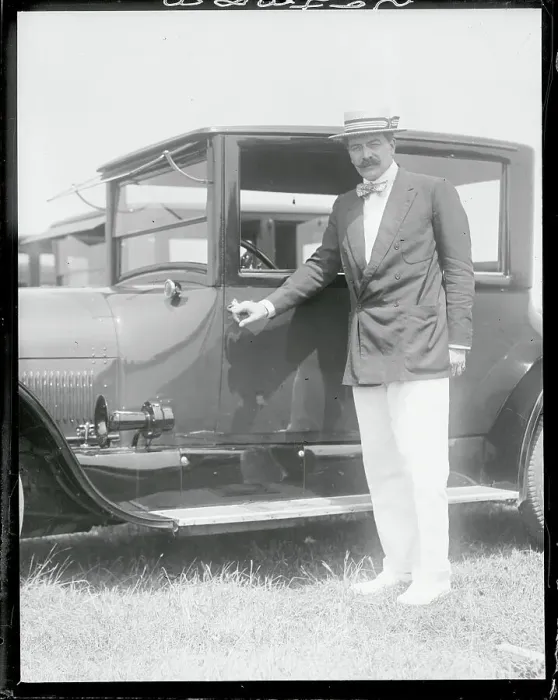 Framed Print : Man Posing Next to a Car Framed Print : Man Posing Next to a Car