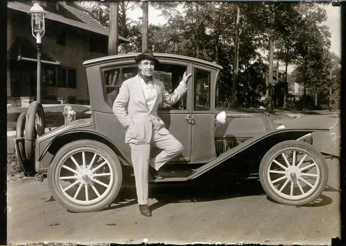 Framed Print : Man Posing with Roadster