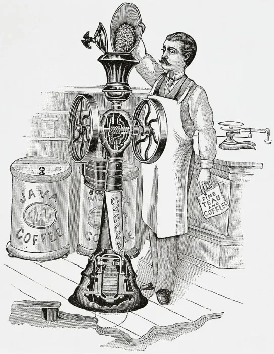 Framed Print : Man Pouring Coffee Beans into Grinding Machine Framed Print : Man Pouring Coffee Beans into Grinding Machine