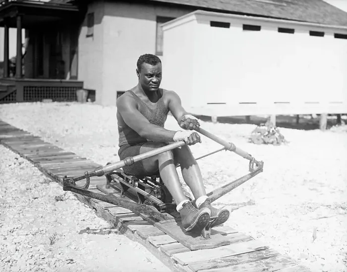 Framed Print : Man Practicing Rowing On A Machine Framed Print : Man Practicing Rowing On A Machine