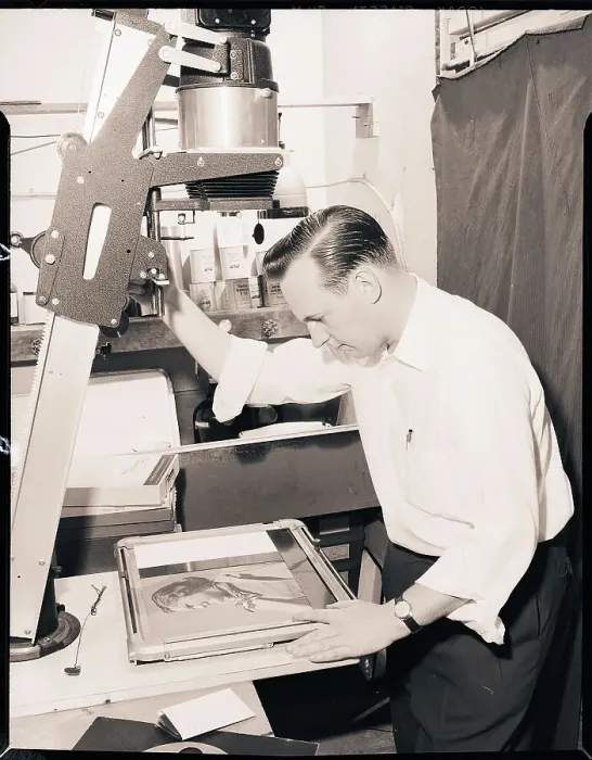 Framed Print : Man Printing a Negative Framed Print : Man Printing a Negative