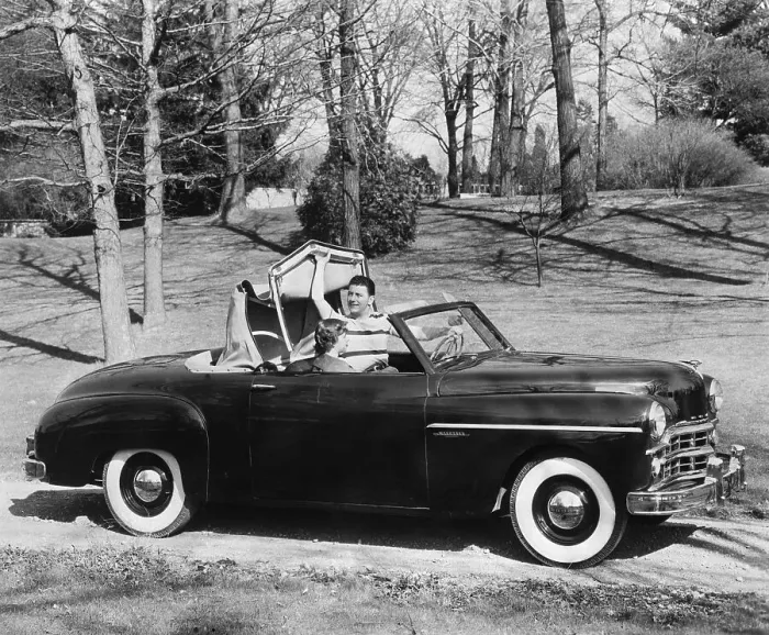 Framed Print : Man Puts Back Convertible Car Top Framed Print : Man Puts Back Convertible Car Top