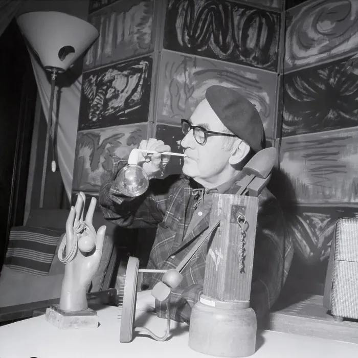 Framed Print : Man Ray Surrounded by Sculptures and Paintings Framed Print : Man Ray Surrounded by Sculptures and Paintings