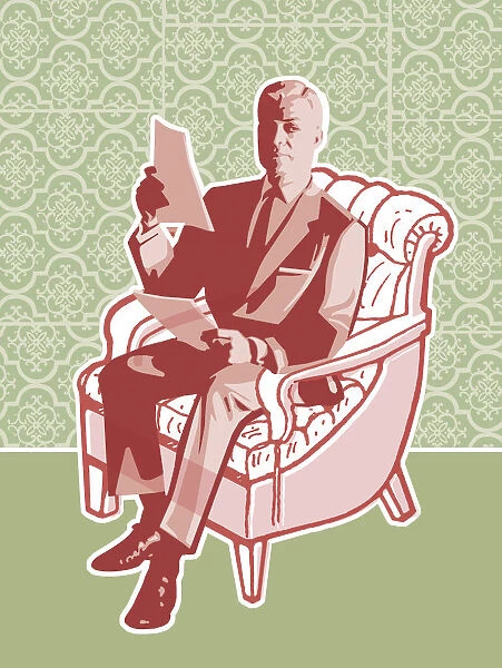 Man Reading a Document in Chair