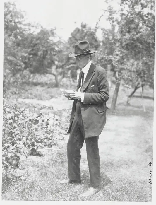 Framed Print : Man Reading in Garden Framed Print : Man Reading in Garden