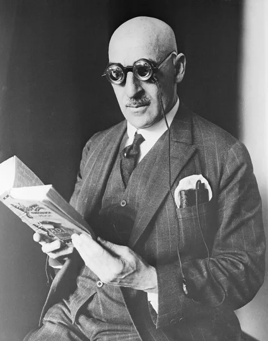 Framed Print : Man Reading with Lighted Eyeglasses Framed Print : Man Reading with Lighted Eyeglasses