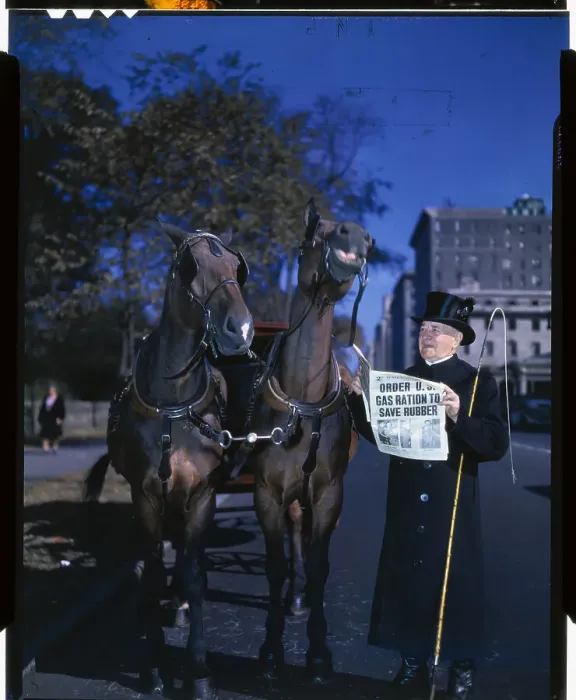 Framed Print : Man Reading Newspaper to Two Horses Framed Print : Man Reading Newspaper to Two Horses