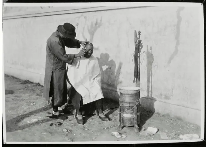 Framed Print : Man Receiving Shave from Barber Framed Print : Man Receiving Shave from Barber