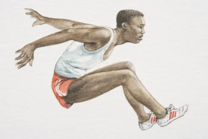 Framed Print : Man in red shorts, white vest and trainers leaping forwards with legs stretched in front of him and arms behind his back, side view