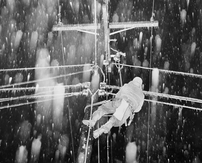 Framed Print : Man Repairing Utility Line in Snowfall Framed Print : Man Repairing Utility Line in Snowfall