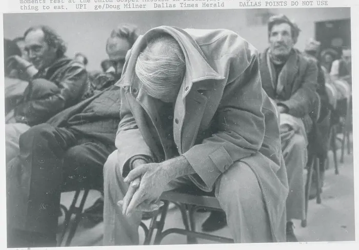 Framed Print : Man Resting with His Jacket Pulled Over His Head