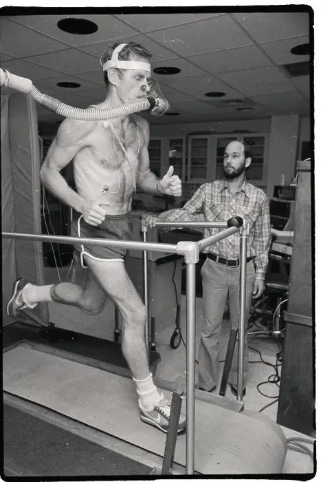 Framed Print : Man Running On Treadmill; Doctor Observi Framed Print : Man Running On Treadmill; Doctor Observi