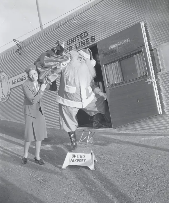 Framed Print : Man in Santa Claus Costume Unloading Toys Framed Print : Man in Santa Claus Costume Unloading Toys