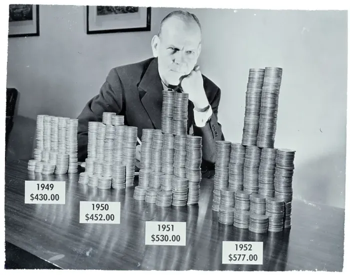 Framed Print : Man Seated W / Coins Representing Tax Incr Framed Print : Man Seated W / Coins Representing Tax Incr