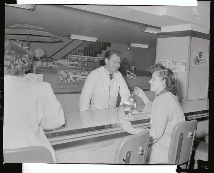 Framed Print : Man Serving Sundae to Girl in Soda Shop Framed Print : Man Serving Sundae to Girl in Soda Shop