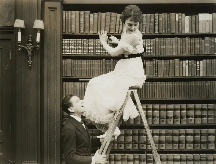 Framed Print : Man Shaking a Woman's Ladder Framed Print : Man Shaking a Woman's Ladder