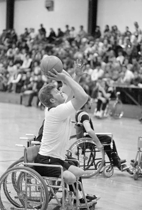 Framed Print : Man Shooting Basket From Wheelchair Framed Print : Man Shooting Basket From Wheelchair