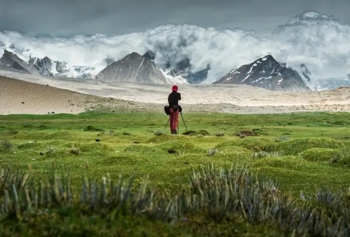 Framed Print : Man shooting at Himalayas Framed Print : Man shooting at Himalayas
