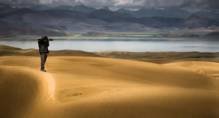 Framed Print : a man on a shooting post over a desert