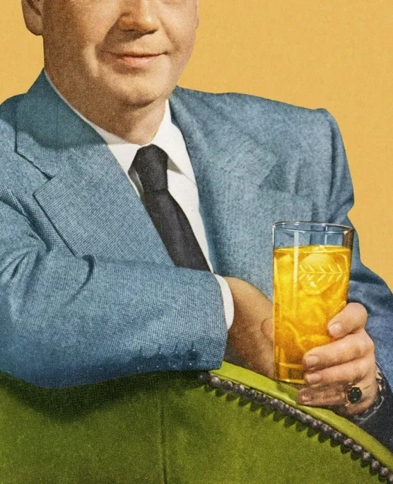 Framed Print : Man Sitting and Holding Drink Framed Print : Man Sitting and Holding Drink