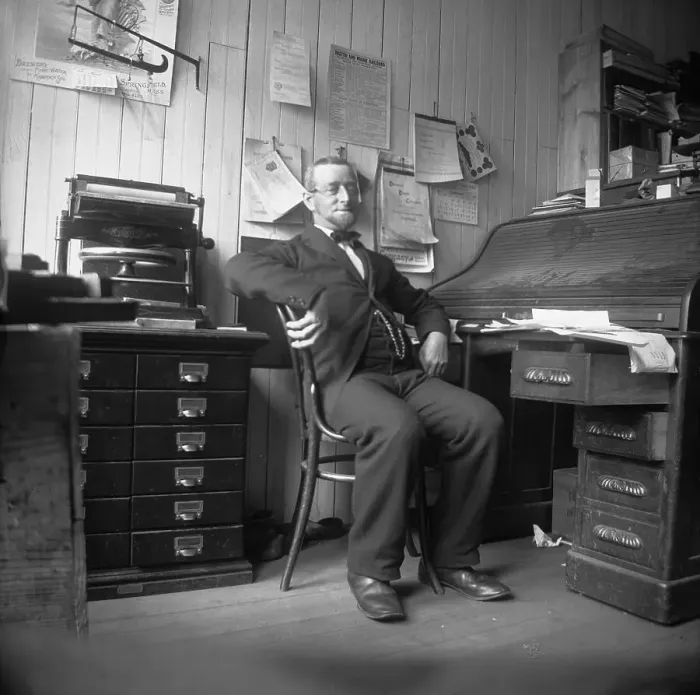 Framed Print : Man Sitting in His Office Framed Print : Man Sitting in His Office