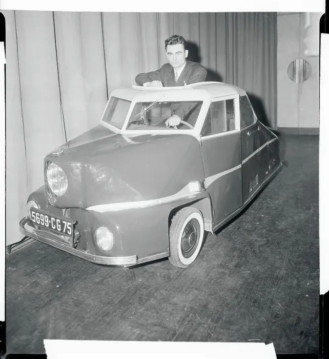 Framed Print : Man Sitting in Three Wheeled Car Framed Print : Man Sitting in Three Wheeled Car
