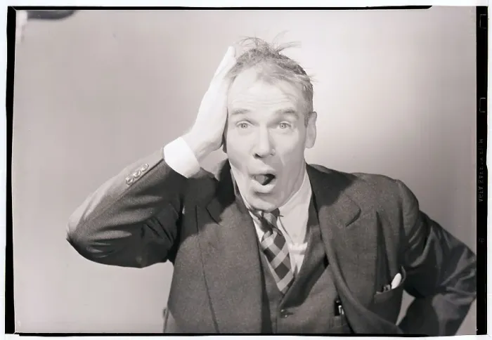 Framed Print : Man Slapping Head in Astonishment Framed Print : Man Slapping Head in Astonishment