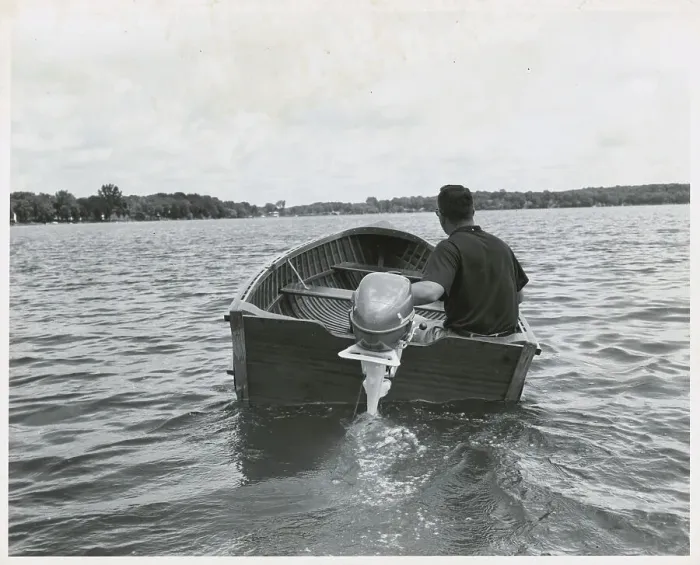 Framed Print : Man in Small Motor Boat Framed Print : Man in Small Motor Boat