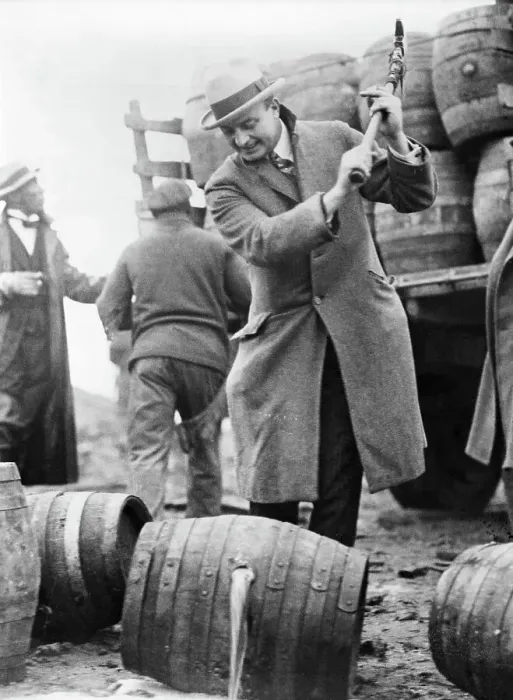 Framed Print : Man Smashing Keg of Beer Framed Print : Man Smashing Keg of Beer