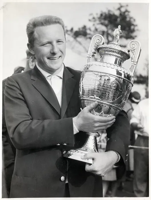 Framed Print : Man Smiling and Holding Golf Trophy Framed Print : Man Smiling and Holding Golf Trophy