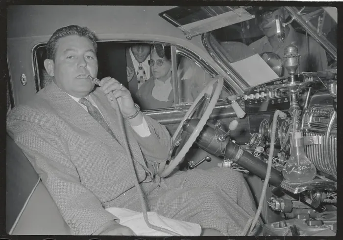 Framed Print : Man Smoking Hookah in Car Framed Print : Man Smoking Hookah in Car