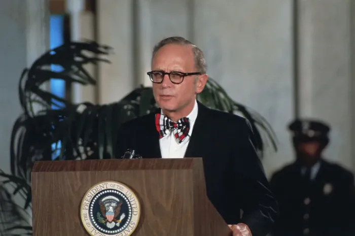 Framed Print : Man Speaking at a Press Conference