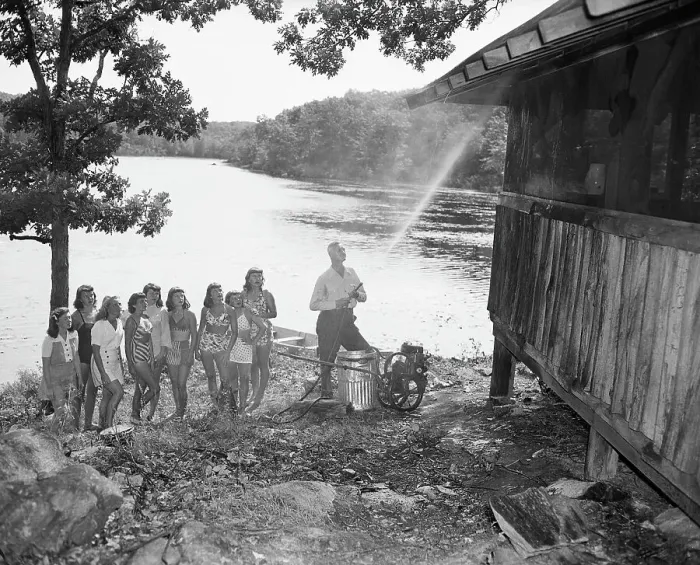 Framed Print : Man Spraying A Camp Building With Ddt Framed Print : Man Spraying A Camp Building With Ddt