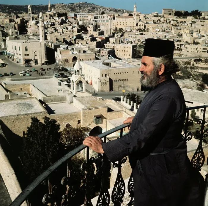 Framed Print : Man Standing on Balcony and Gazing into Bethlehem Framed Print : Man Standing on Balcony and Gazing into Bethlehem