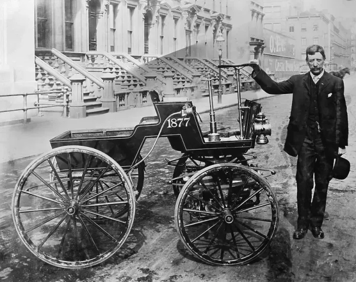 Framed Print : Man Standing with Original Selden Car Framed Print : Man Standing with Original Selden Car