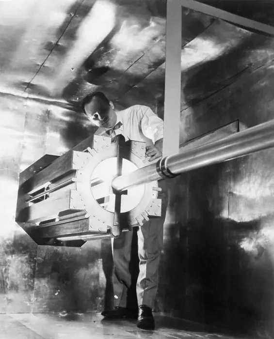 Framed Print : Man Standing Next to a Reactor