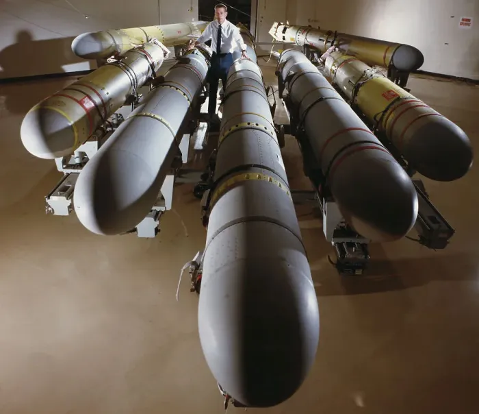 Framed Print : Man Standing with Tomahawk Cruise Missiles Framed Print : Man Standing with Tomahawk Cruise Missiles