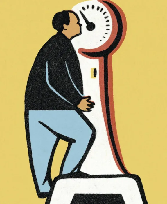 Framed Print : Man Stepping on Scale Framed Print : Man Stepping on Scale