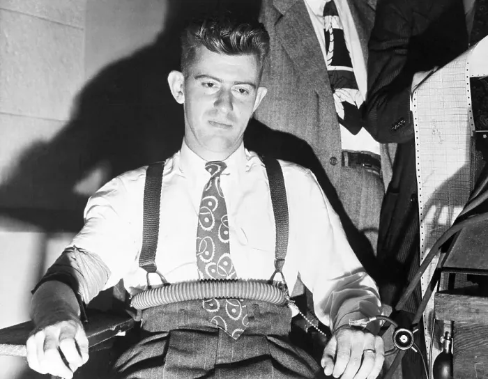 Framed Print : Man Strapped In Seat, Eyes Red, Testifying