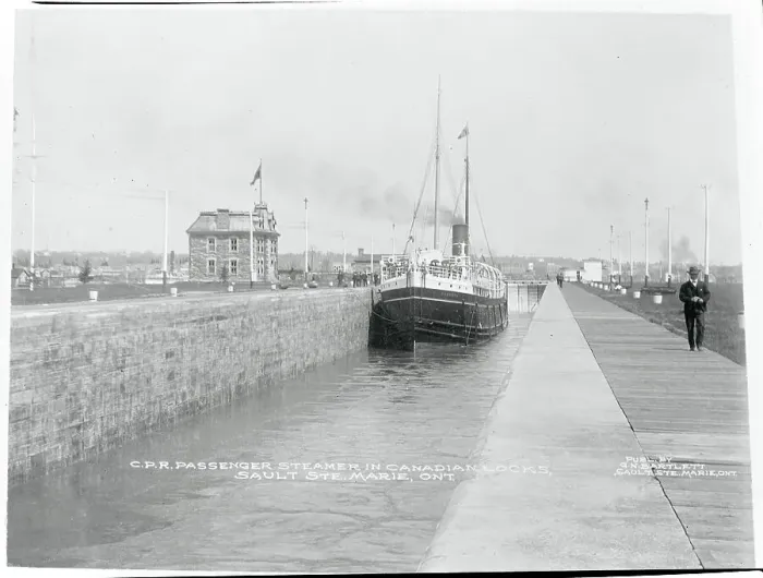 Framed Print : Man Strolling Along Harbor Framed Print : Man Strolling Along Harbor