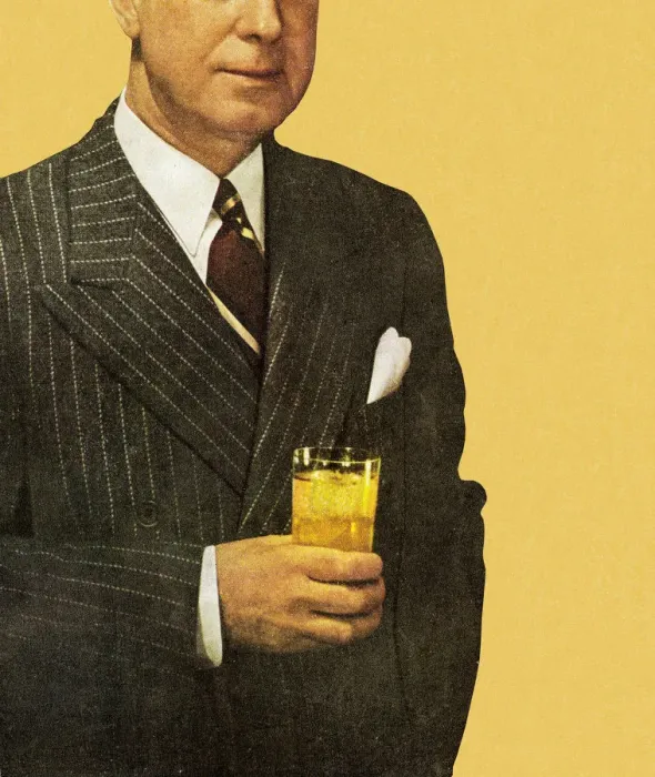 Framed Print : Man in Suit Holding Beverage Framed Print : Man in Suit Holding Beverage