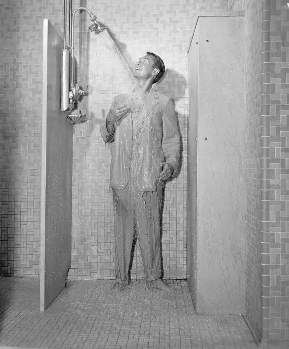 Framed Print : Man in Suit Taking Shower