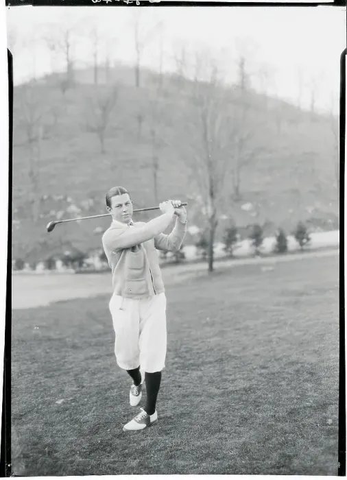 Framed Print : Man Swinging a Golf Club Framed Print : Man Swinging a Golf Club